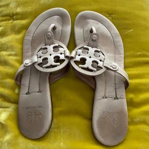 Very work but still some wearing left! Classic Tory Burch Miller sandals.